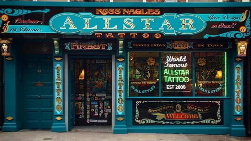 The teal shopfront of Ross Nagle’s Allstar Tattoo at 44 Wickham Street, Limerick, with the number 44 on the door